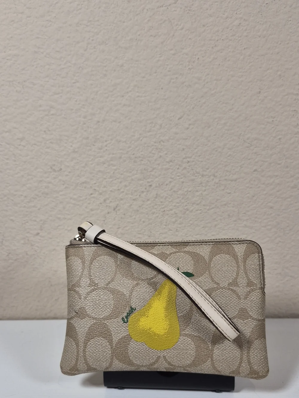 Coach Corner Zip Wristlet In Signature Canvas With Pear